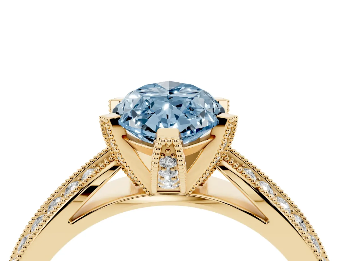 Fancy Blue Marquise Cut Diamond Solitaire Ring with Milgrain Round Pavé Band and Prong Setting Yellow gold