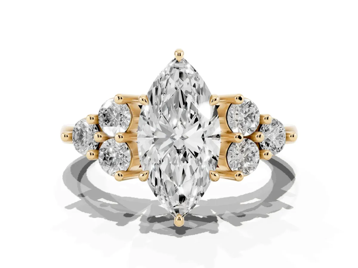 Marquise Cut Brilliant Diamond Cluster Accent Solitaire Ring with Prong Setting Yellow gold