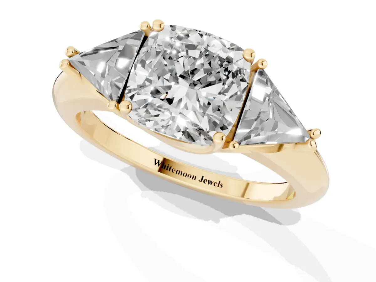 Three-Stone Cushion Cut Diamond Engagement Ring with Trillion Side Stones and Prong Setting Yellow gold