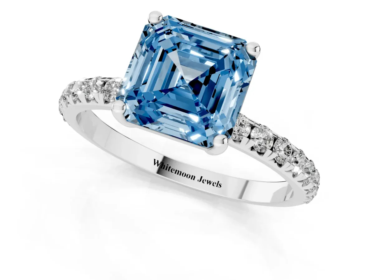 Fancy Blue Asscher Cut Cut Diamond Solitaire Ring with Micro Pave Band and Four Prong Setting Silver