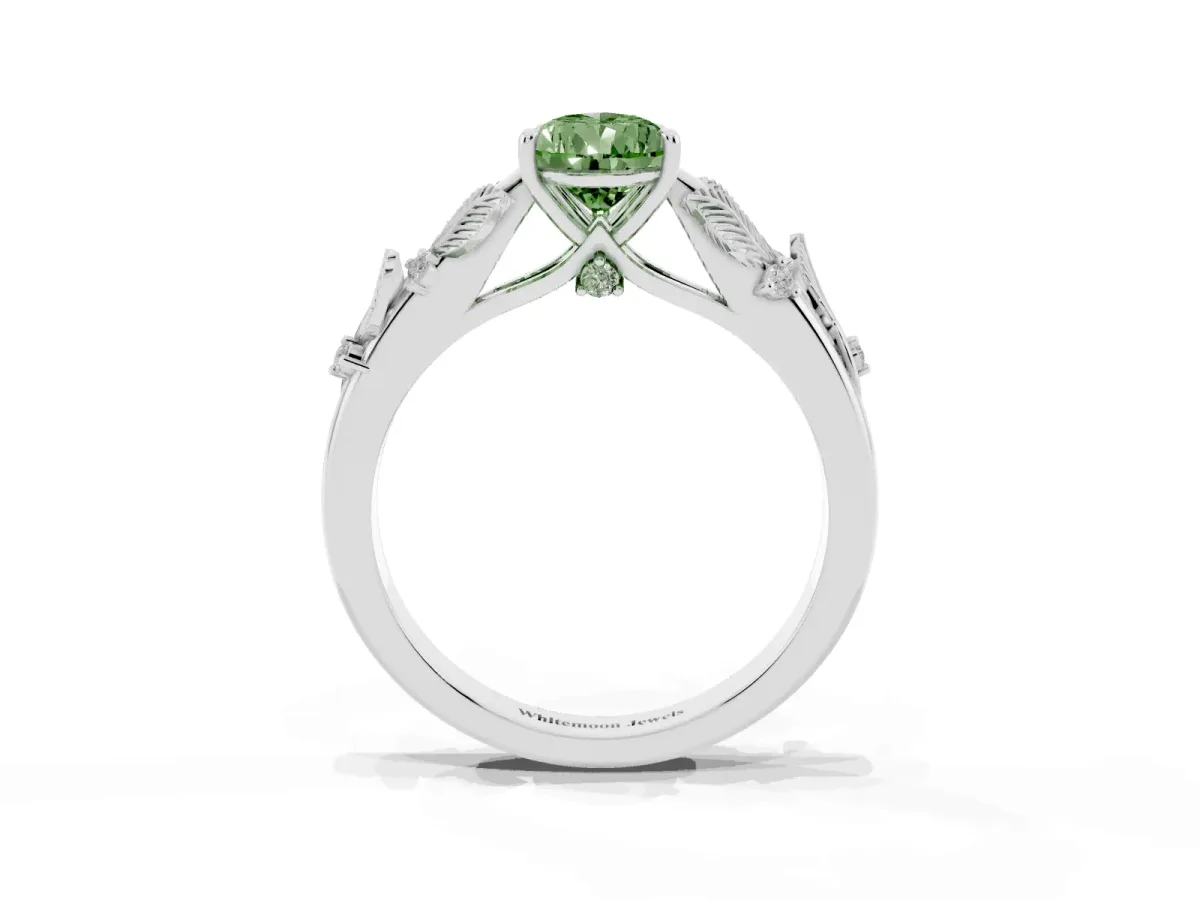 Fancy Green Pear Cut Diamond Solitaire Ring with Leaf Motif Band and Four-Prong Setting Silver