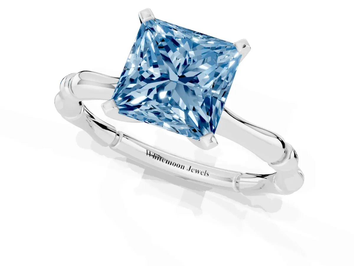 Fancy Blue Princess Cut Solitaire Diamond Ring with Bamboo Band and Four-Prong Setting Silver