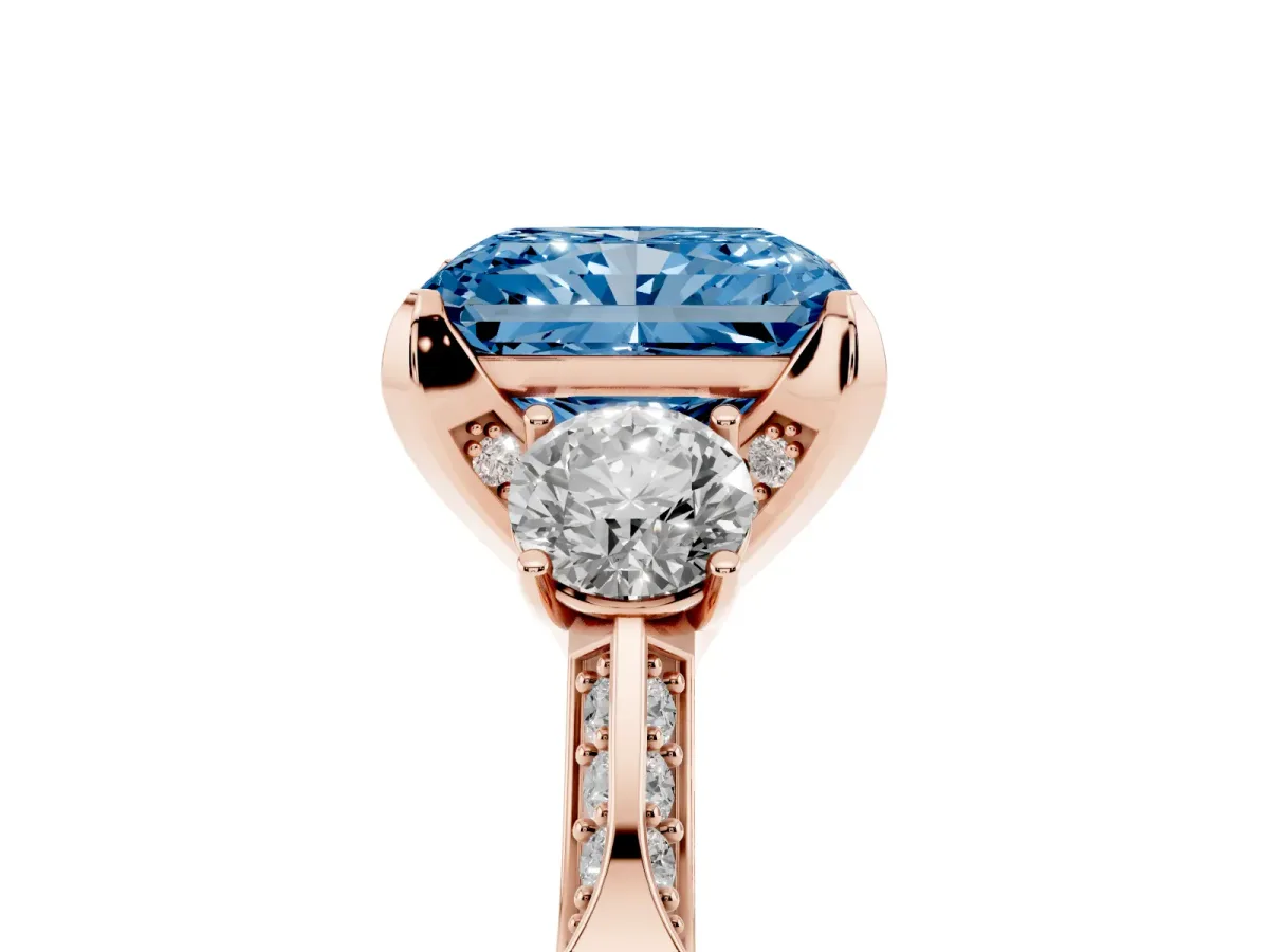 Fancy Blue Radiant Cut Brilliant Three-Stone Diamond Ring with Pavé Band and Four-Prong Setting Rose gold