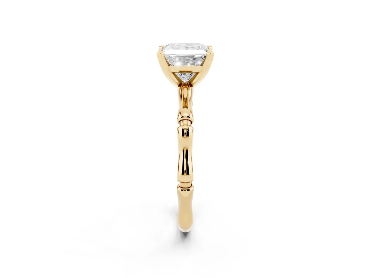 Princess Cut Solitaire Diamond Ring with Bamboo Band and Four-Prong Setting Yellow gold