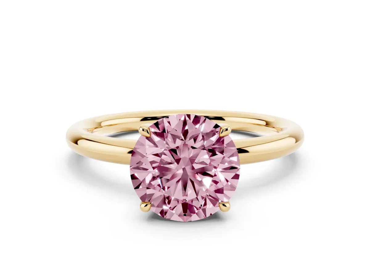 Fancy Pink Round Cut Diamond Solitaire Ring with Thin Band and Four-Prong Setting Yellow gold