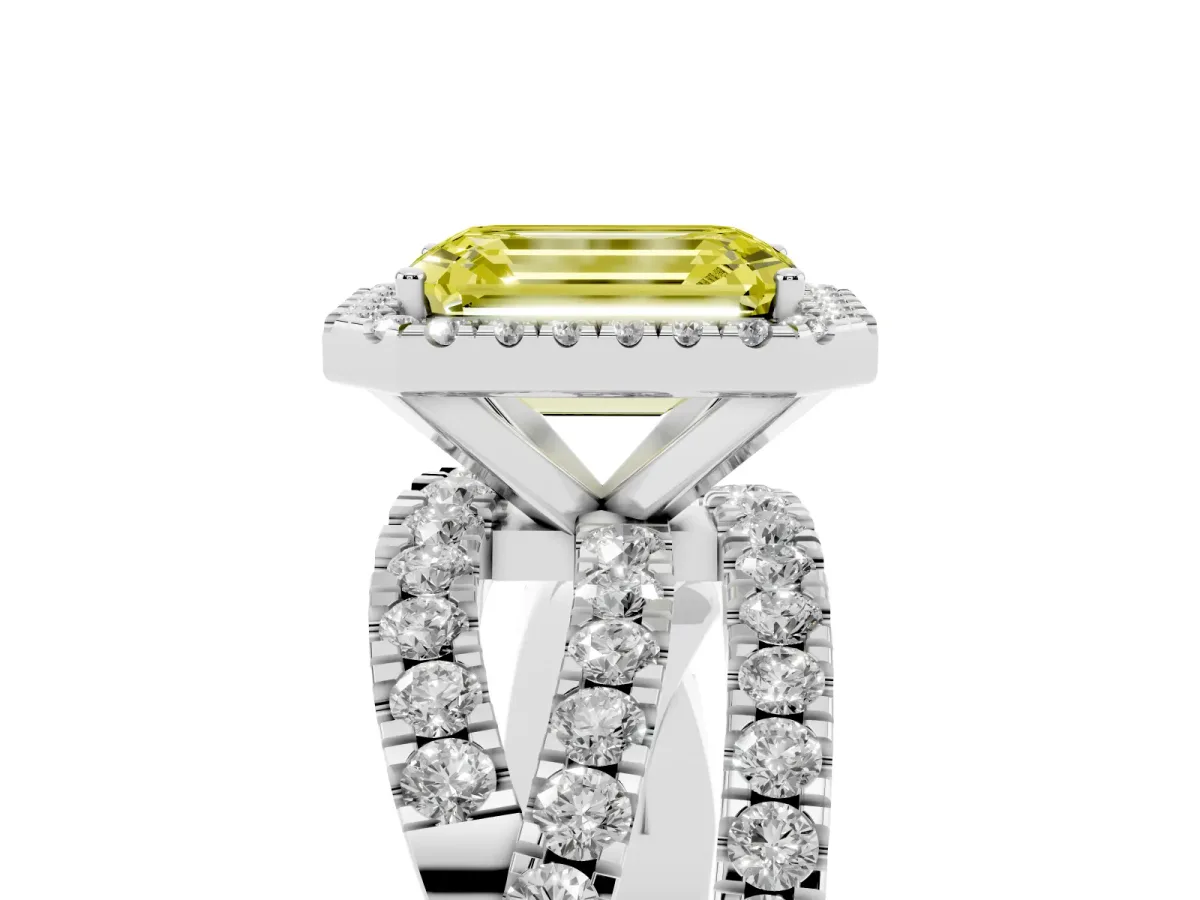 Fancy Yellow Emerald Cut Diamond Halo Ring with Round Split Shank and Prong Setting White gold