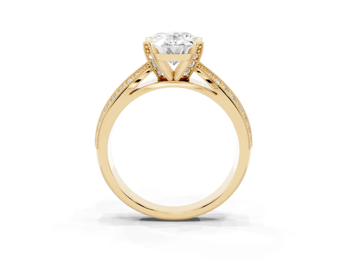 Oval Cut Diamond Solitaire Ring with Milgrain Round Pavé Band and Prong Setting Yellow gold