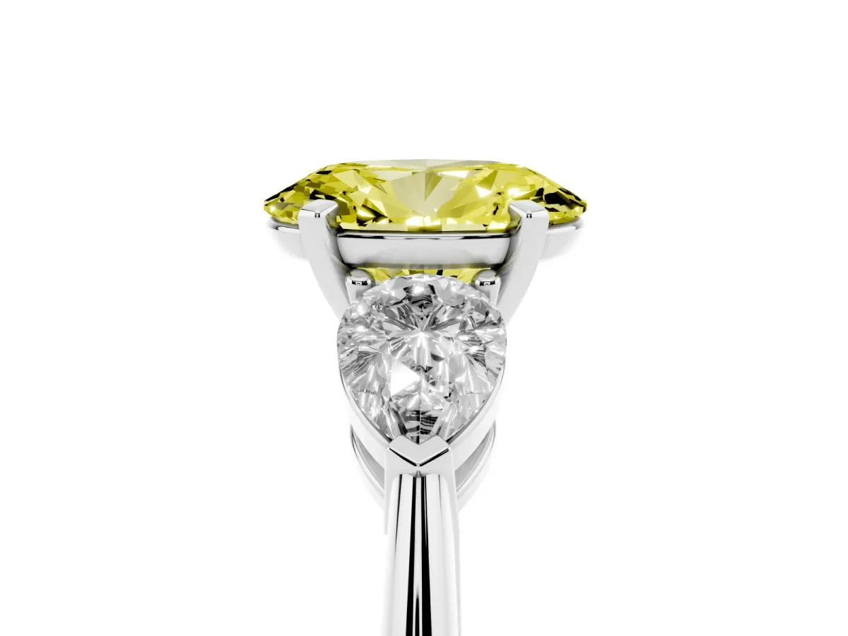 Fancy Yellow Three-Stone Oval Cut Diamond Ring with Pear Side Stones and Four-Prong Setting Platinum