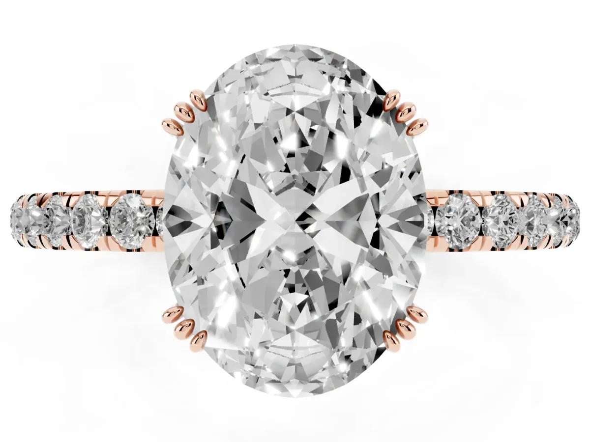 Oval Cut Brilliant Solitaire with Pavé Band and Claw Prong Setting Rose gold