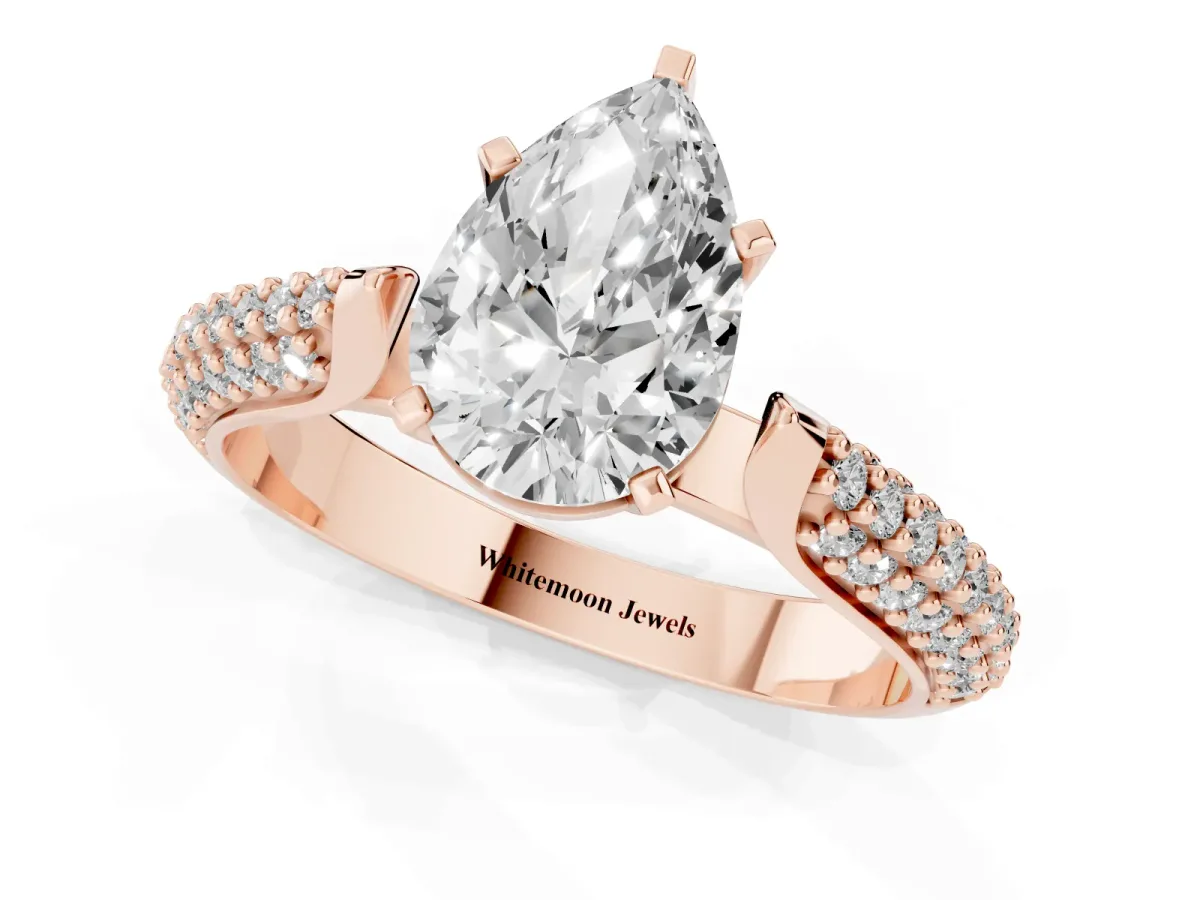 Pear Cut Diamond Solitaire Engagement Ring with Multi-Row Round Pavé Band and Prong Setting Rose gold