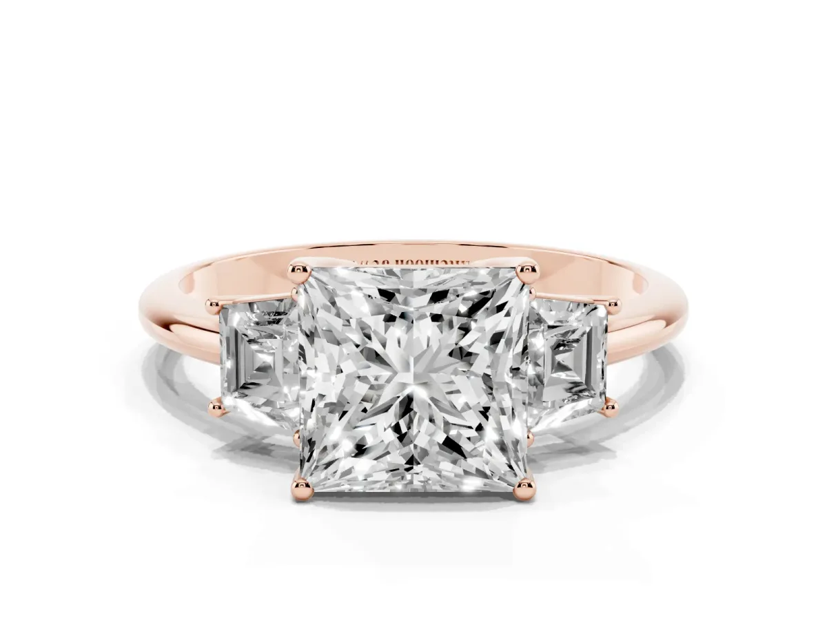 Princess Cut Diamond Three-Stone Ring with Trapezoid Side Stones and Prong Setting Rose gold