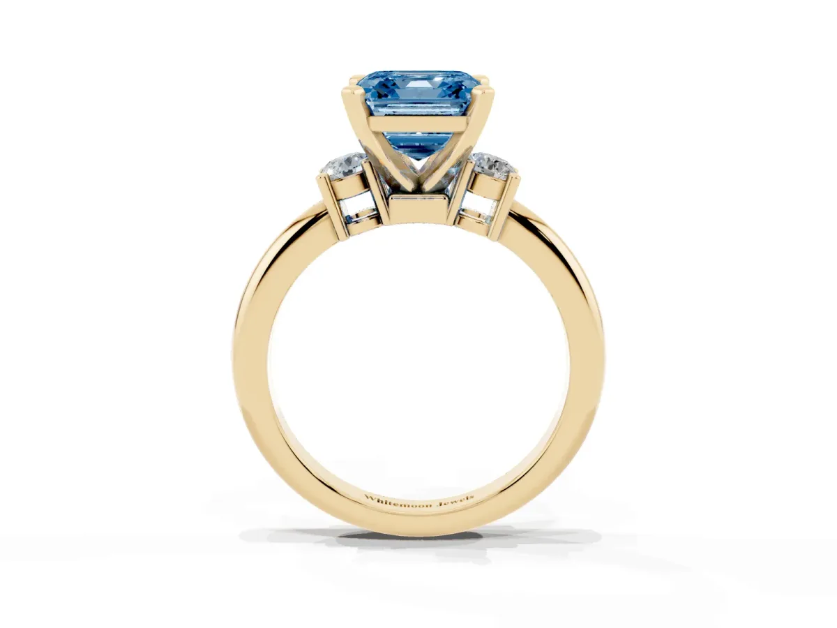 Fancy Blue Three-Stone Asscher Cut Cut Diamond Solitaire with Prong Setting and Classic Band Yellow gold