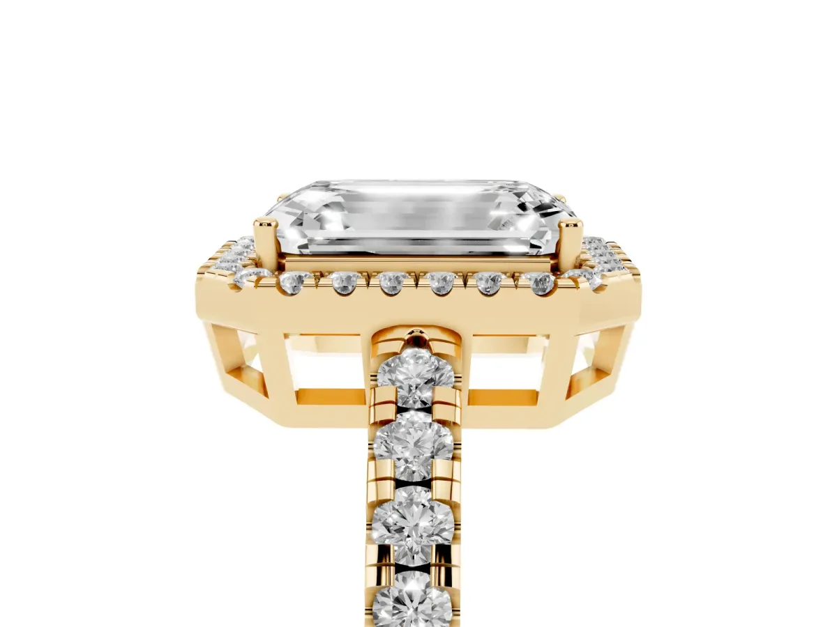 Emerald Cut Diamond Halo Ring with Pavé Band and Four-Prong Setting Yellow gold