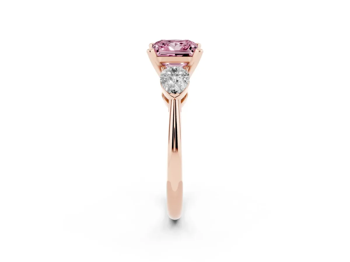 Fancy Pink Three-Stone Princess Cut Diamond Ring with Pear Side Stones and Four-Prong Setting Rose gold
