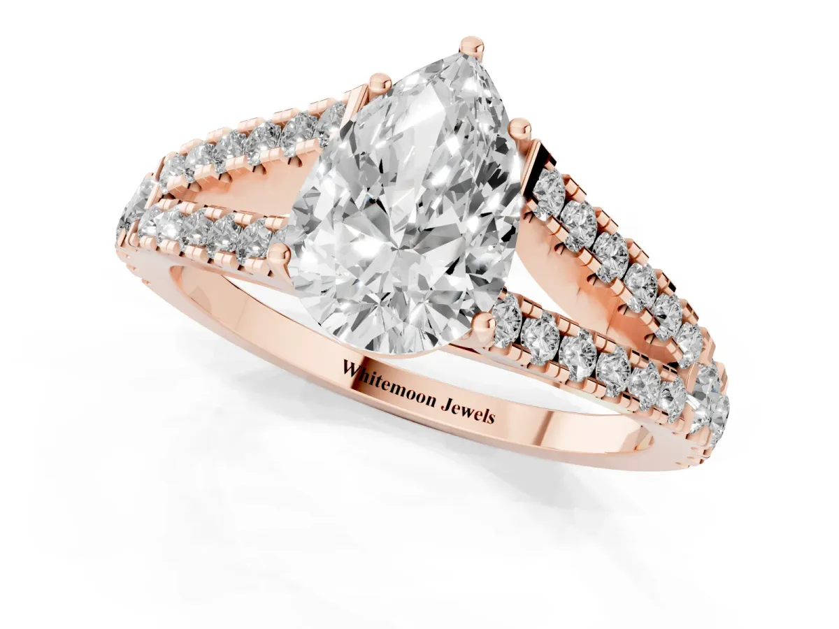 Pear Cut Diamond Split Shank Pavé Engagement Ring with Four-Prong Setting Rose gold