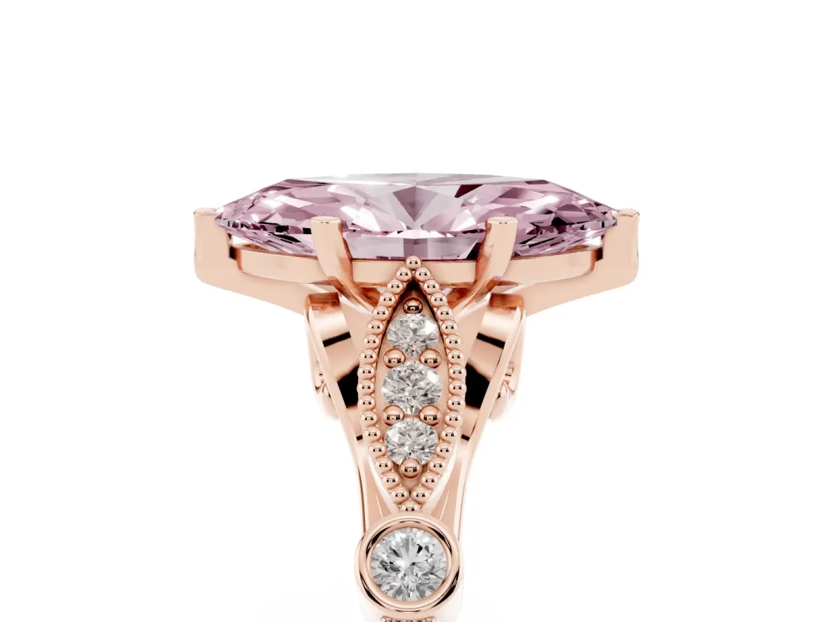 Fancy Pink Marquise Cut Cut Diamond with Milgrain Marquise and Bezel Accents on a Solitaire Band with Prong Setting Rose gold