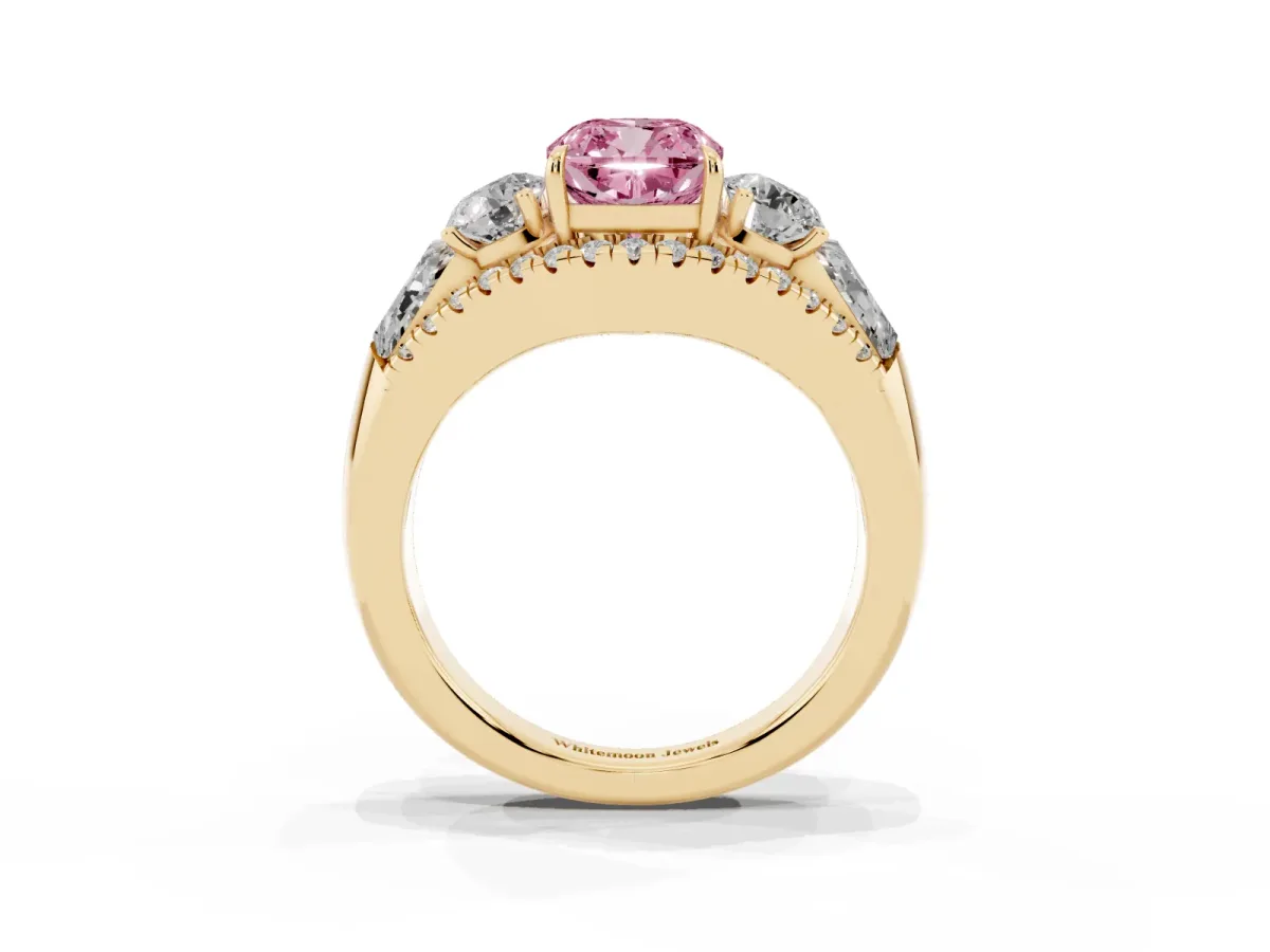 Fancy Pink Three-Stone Cushion Cut Diamond Engagement Ring with Pave Band and Prong Setting Yellow gold