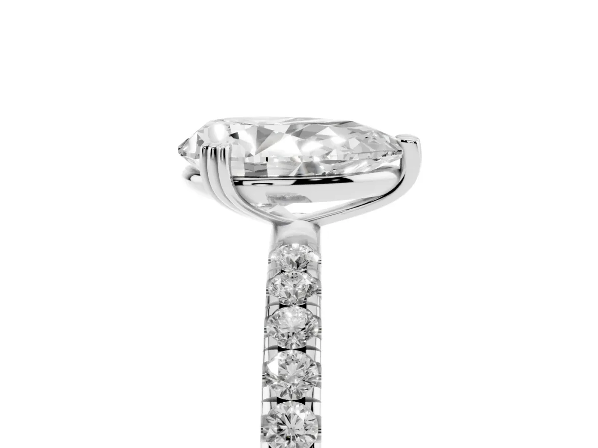 Pear Cut Brilliant Solitaire with Pavé Band and Claw Prong Setting Silver