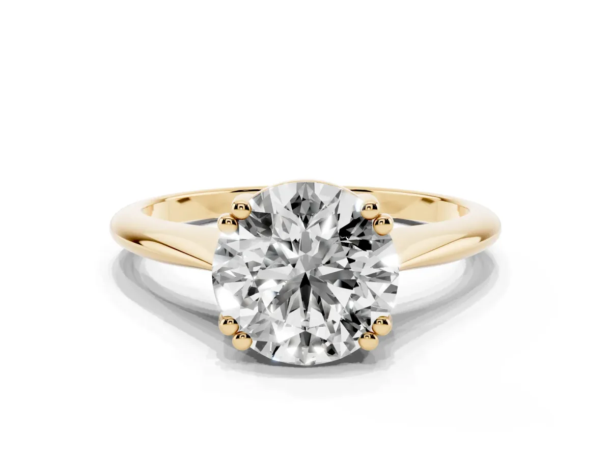 Round Cut Solitaire Diamond Ring with Six-Prong Setting and Classic Band Yellow gold