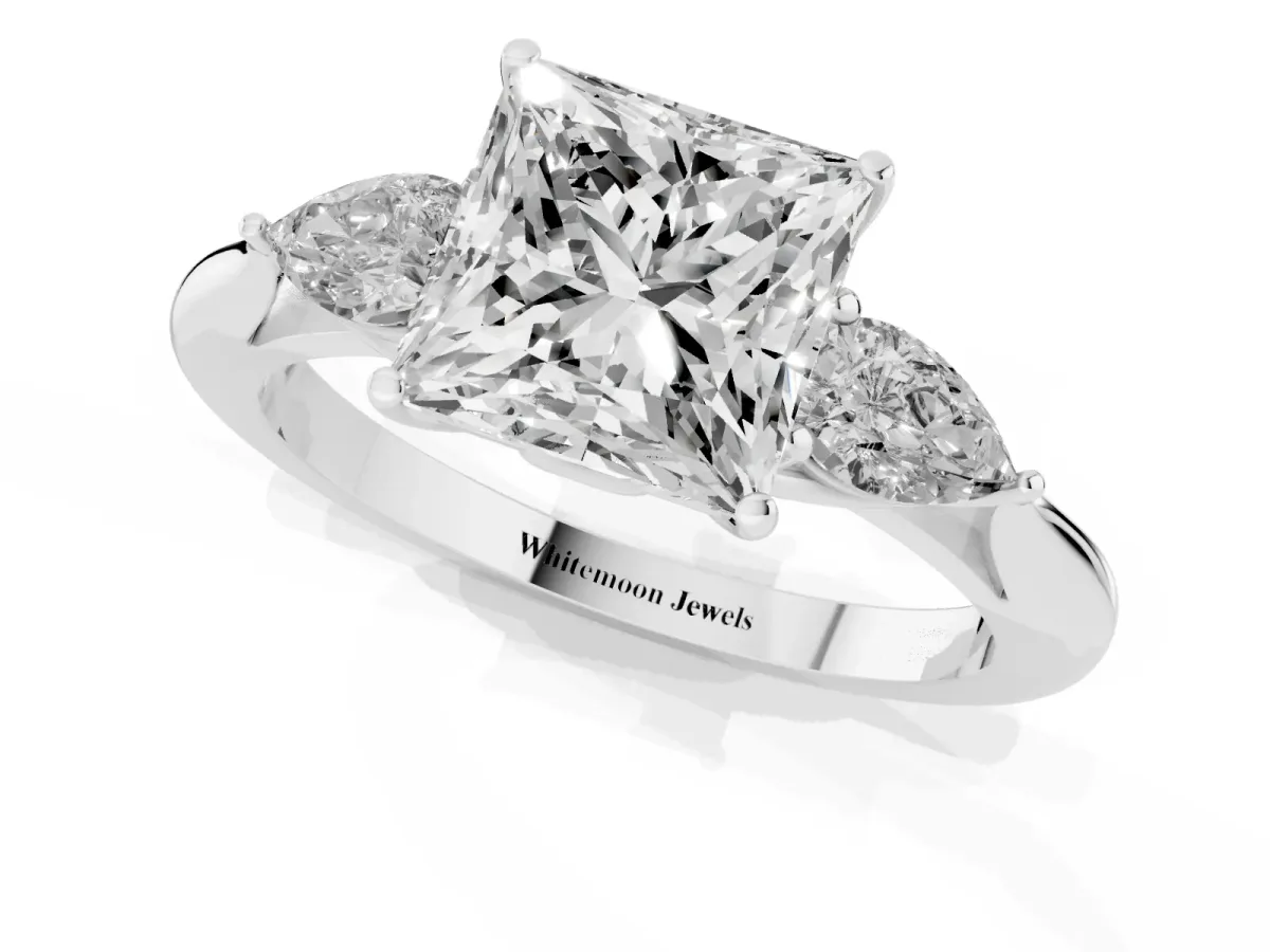 Three-Stone Princess Cut Diamond Ring with Pear Side Stones in Four-Prong Setting Silver