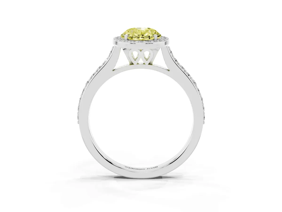 Fancy Yellow Oval Cut Diamond Halo Engagement Ring with Round Pavé Shoulders and Prong Setting White gold