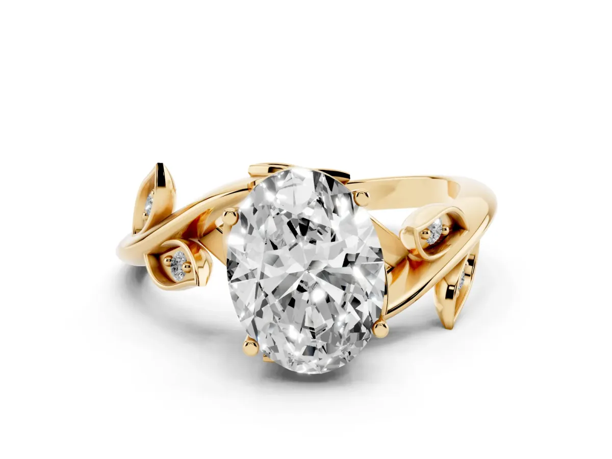 Oval Cut Solitaire Twist Engagement Ring with Leaf Accents and Prong Setting Yellow gold