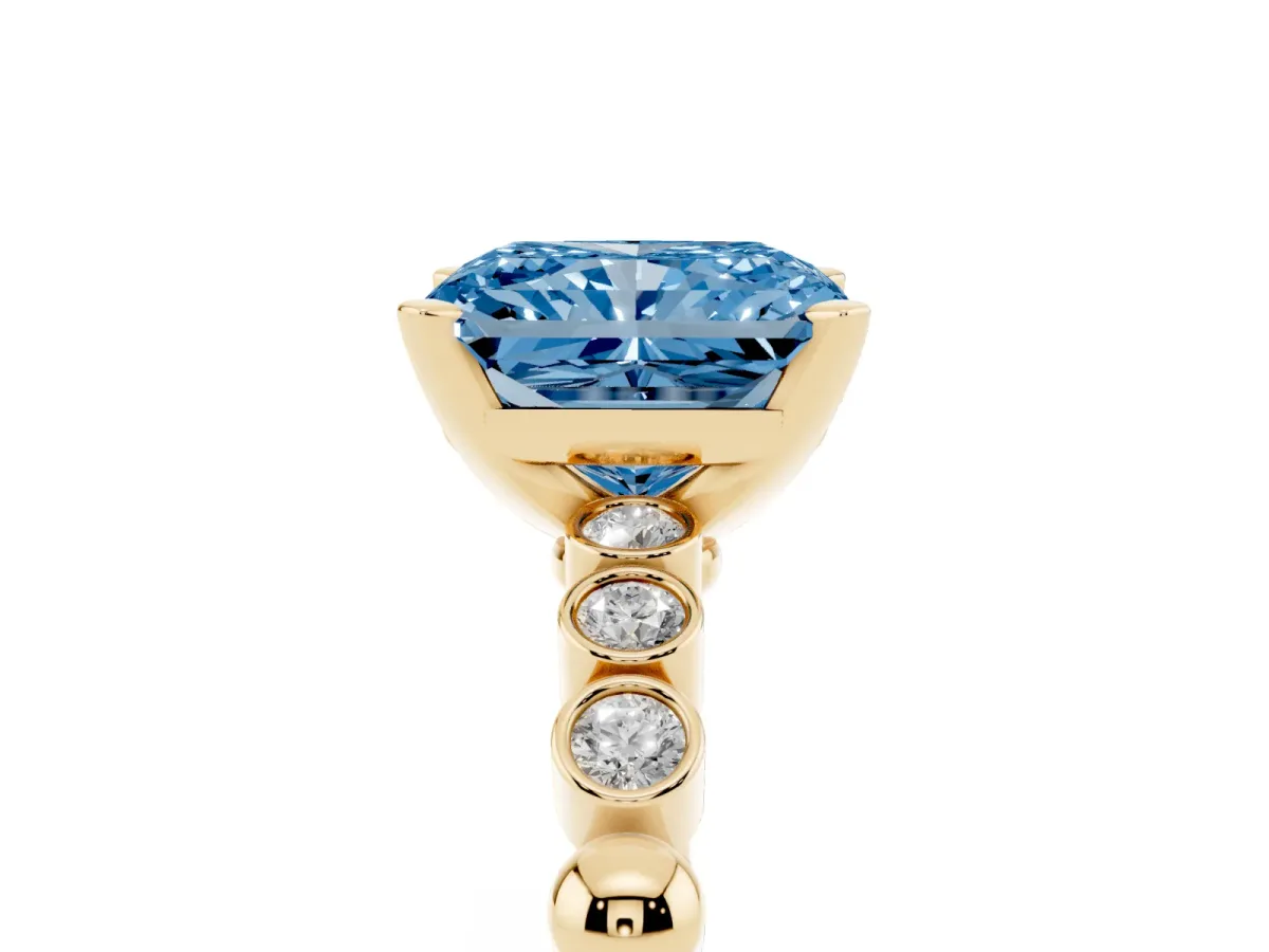 Fancy Blue Radiant Cut Solitaire Bezel Accent Diamond Engagement Ring with Beaded Band and Four-Prong Setting Yellow gold