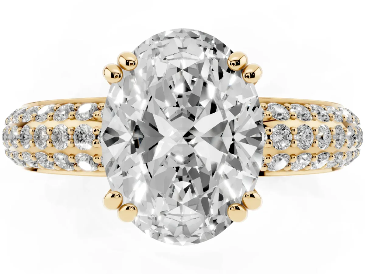Oval Cut Diamond Solitaire Ring with Multi-Row Round Pavé Band and Prong Setting Yellow gold