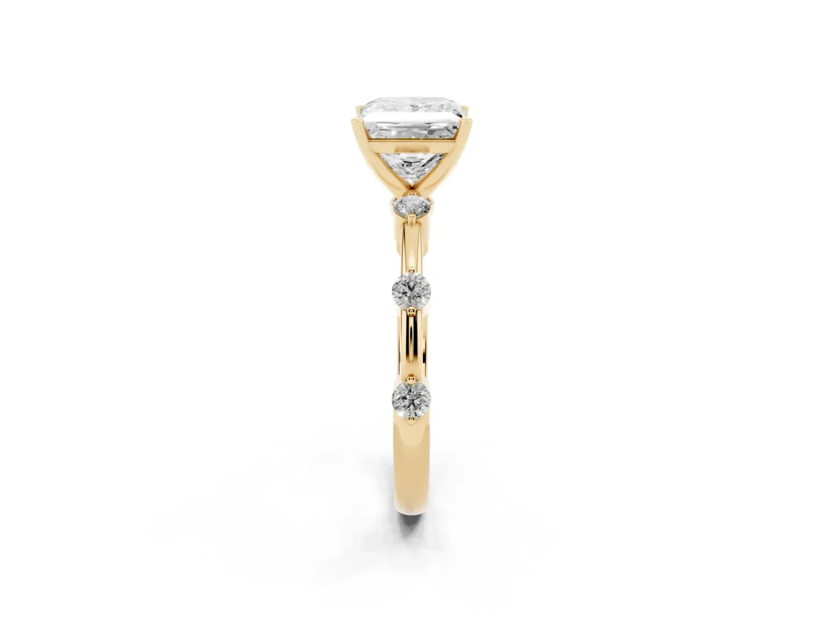 Princess Cut Solitaire Diamond Ring with Bezel Set Side Stones and Prong Setting Yellow gold