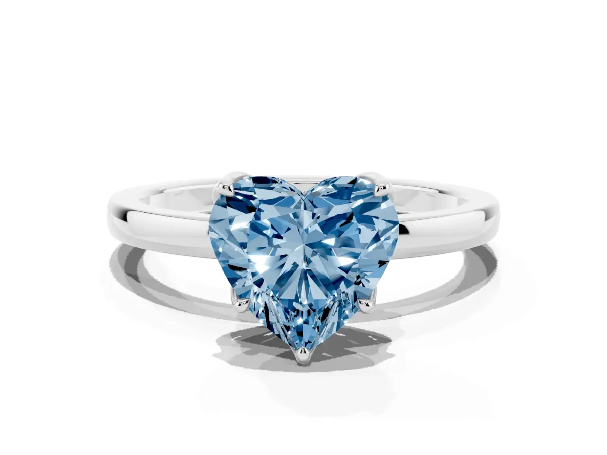 Fancy Blue Heart Cut Diamond Solitaire Ring with Thin Band and Prong Setting Silver