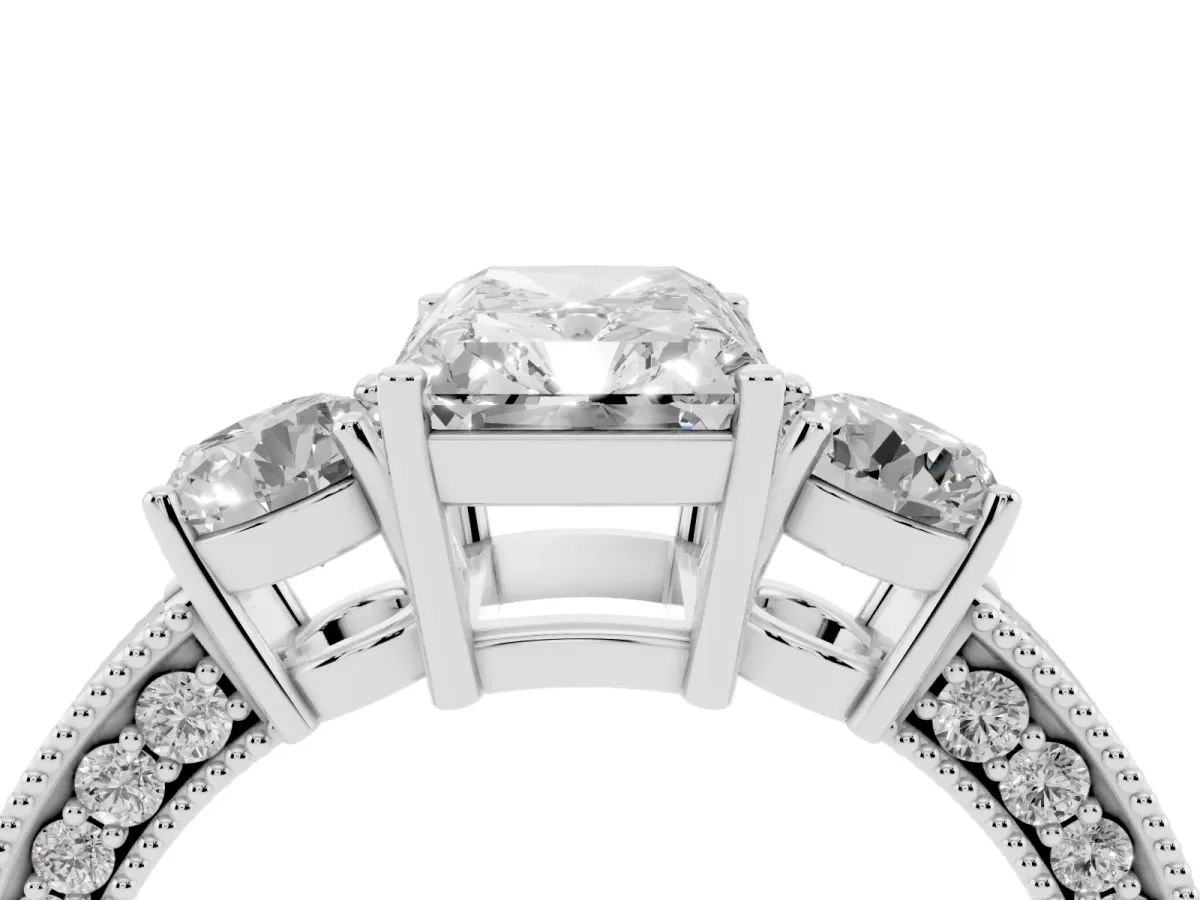 Radiant Cut Three-Stone Diamond Ring with Pavé Band and Four-Prong Setting Platinum