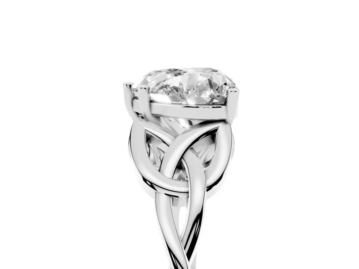 Heart Cut Diamond Solitaire Engagement Ring with Celtic Knot Band and Four-Prong Setting Platinum