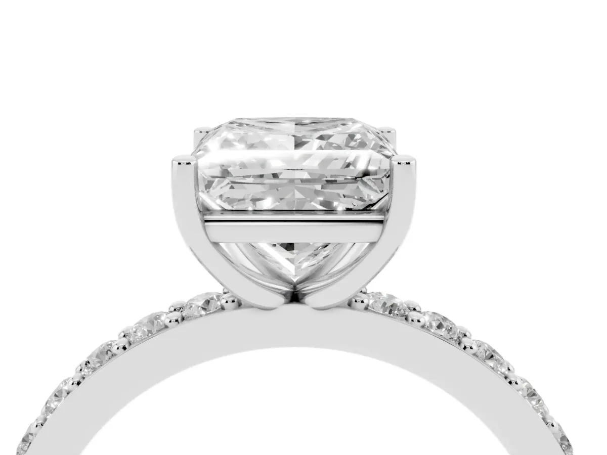 Princess Cut Cut Diamond Solitaire with Pave Band and Four-Prong Setting Platinum