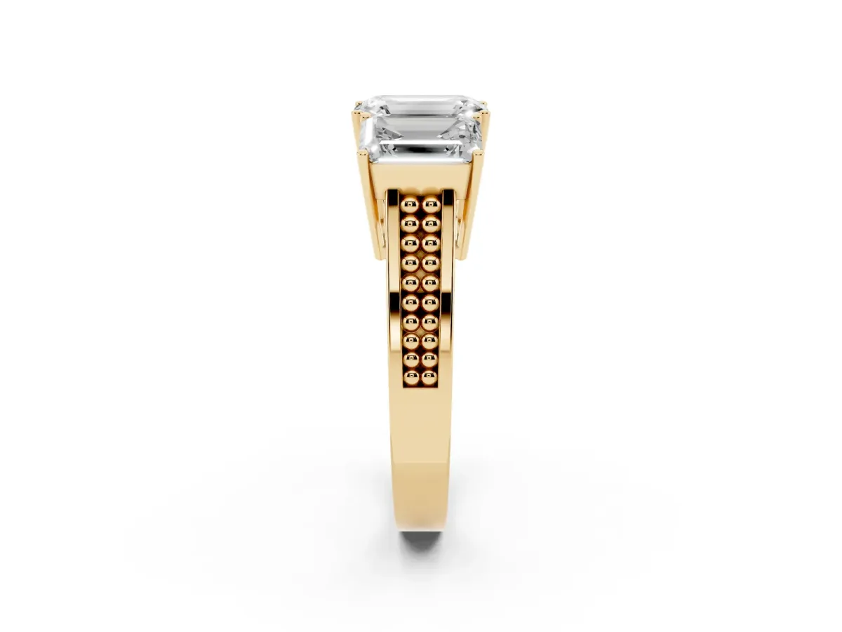 Emerald Cut Diamond Three-Stone Ring with Prong Setting and Textured Band Yellow gold