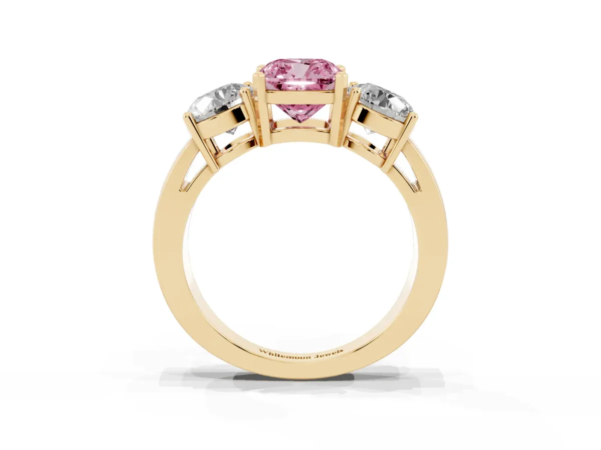 Fancy Pink Three-Stone Cushion Cut Diamond Ring with Round Side Stones, Classic Band, and Four-Prong Setting Yellow gold