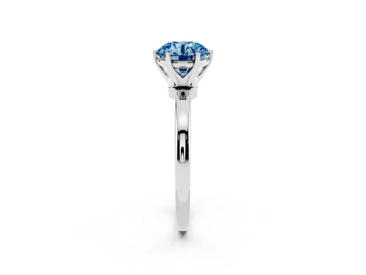 Fancy Blue Round Cut Solitaire Diamond Ring with Six-Prong Setting on a Classic Band Silver