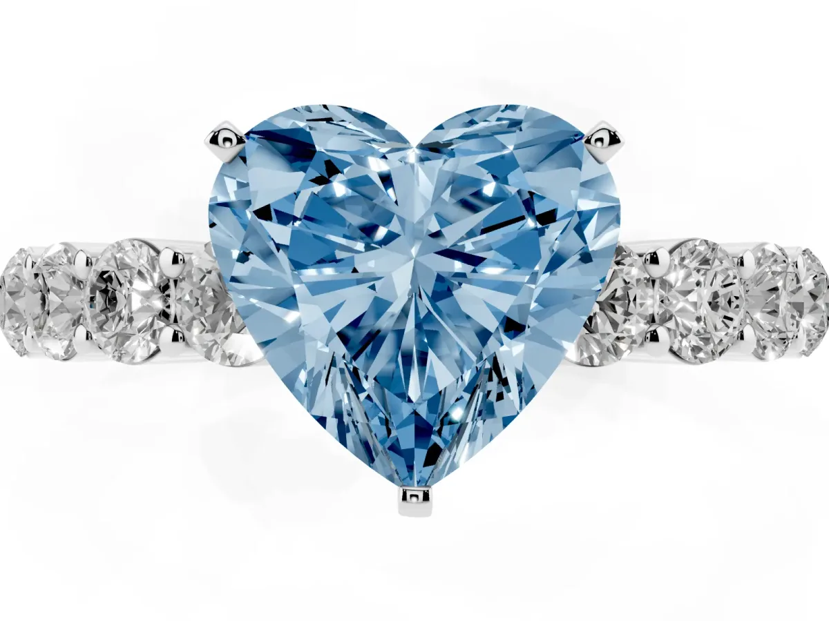 Fancy Blue Heart Cut Diamond Solitaire Ring with Shared Prong Round Side Stones White gold
