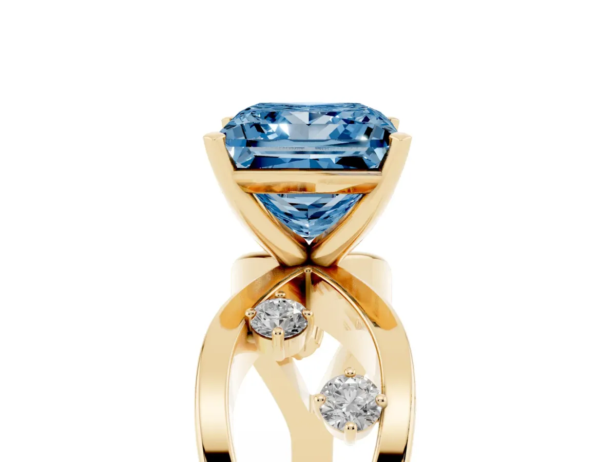 Fancy Blue Princess Cut Cut Solitaire Diamond with Side Stones on Criss-Cross Band and Four-Prong Setting Yellow gold