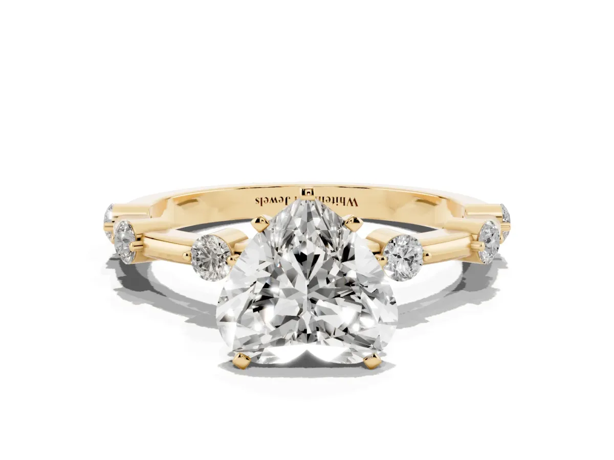 Heart Cut Solitaire Diamond Ring with Bezel Set Side Stones and Prong Setting Yellow gold