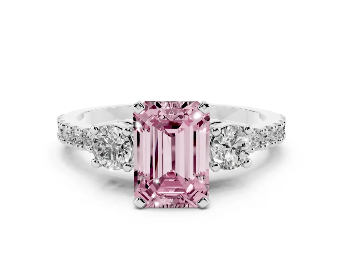 Fancy Pink Emerald Cut Three-Stone Diamond Pavé Band with Prong Setting Platinum