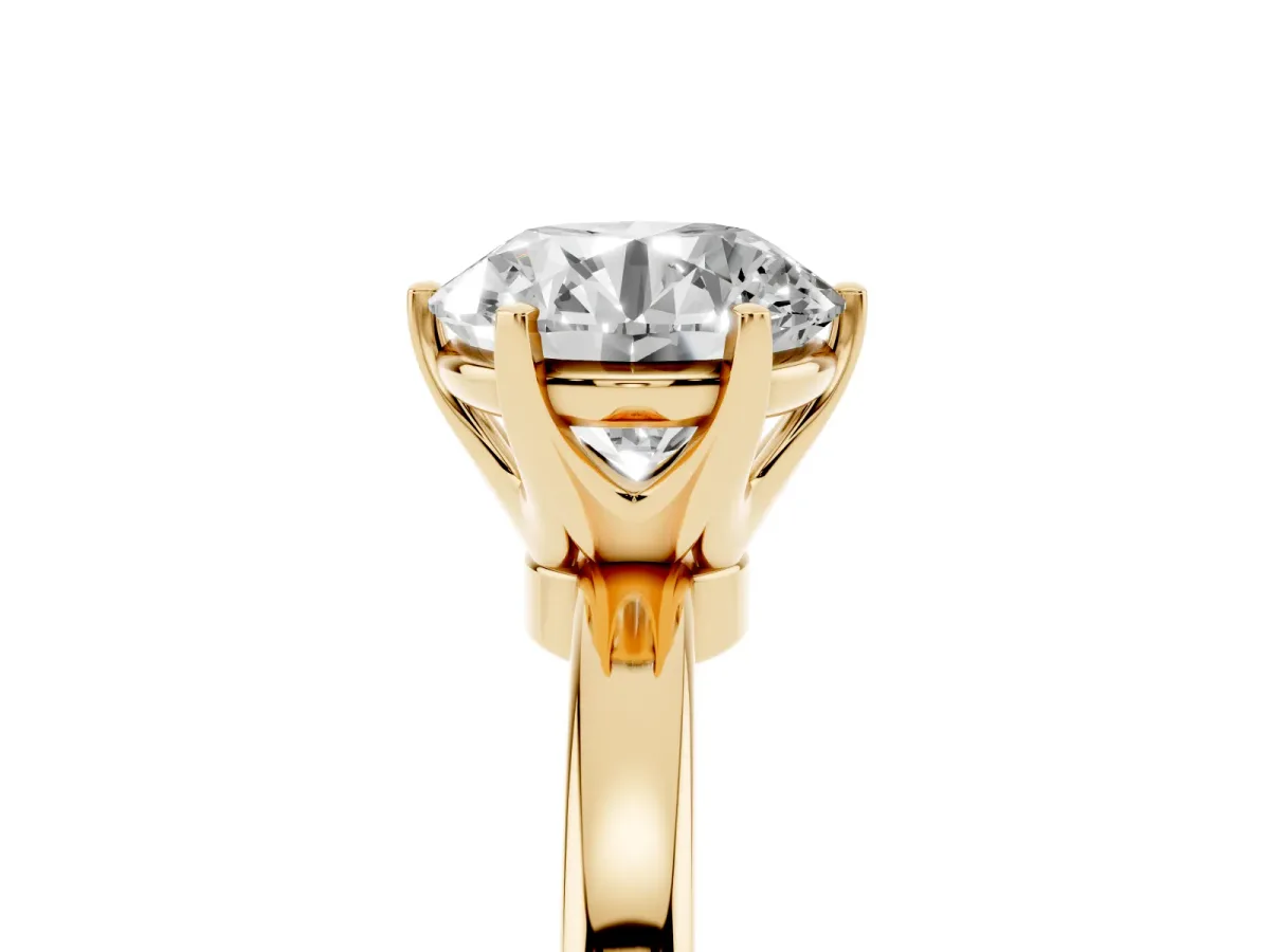Round Cut Solitaire Diamond Ring with Six-Prong Setting on a Classic Band Yellow gold