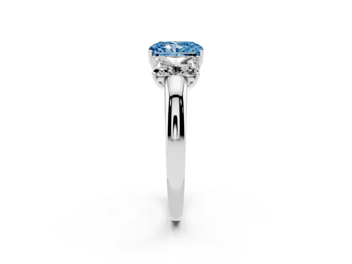 Fancy Blue Radiant Cut Diamond Three-Stone Ring with Four-Prong Setting and Classic Band Silver