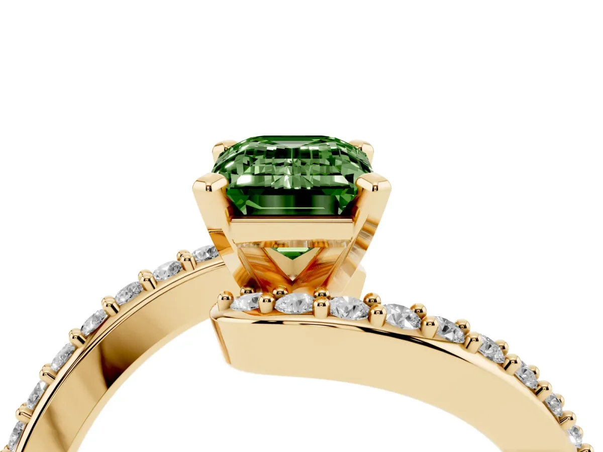 Fancy Green Emerald Cut Solitaire Twist Band with Pave Set Diamonds and Four-Prong Setting Yellow gold