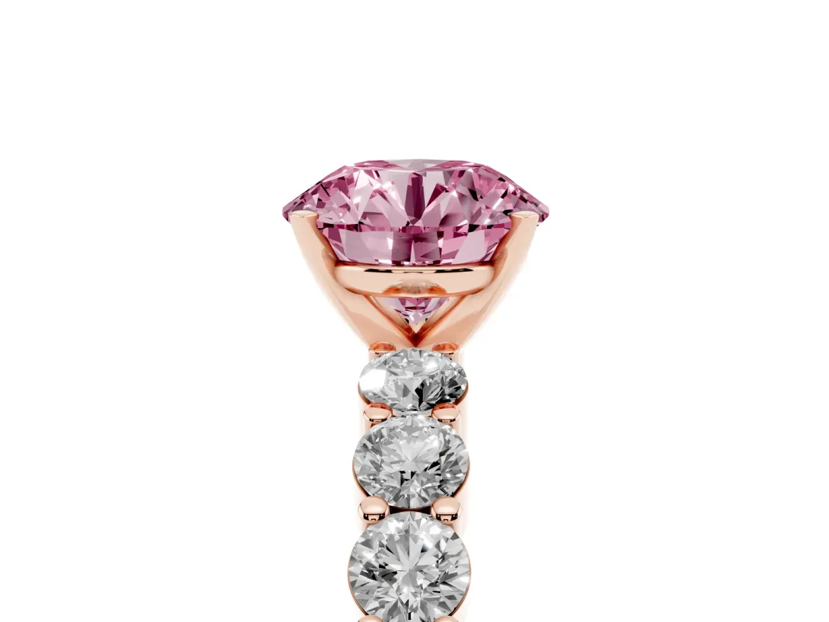 Fancy Pink Round Cut Diamond Solitaire Ring with Shared Prong Round Side Stones Rose gold