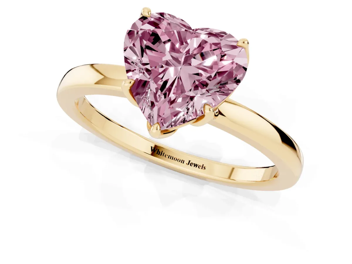 Fancy Pink Heart Cut Diamond Solitaire Ring with Thin Band and Prong Setting Yellow gold