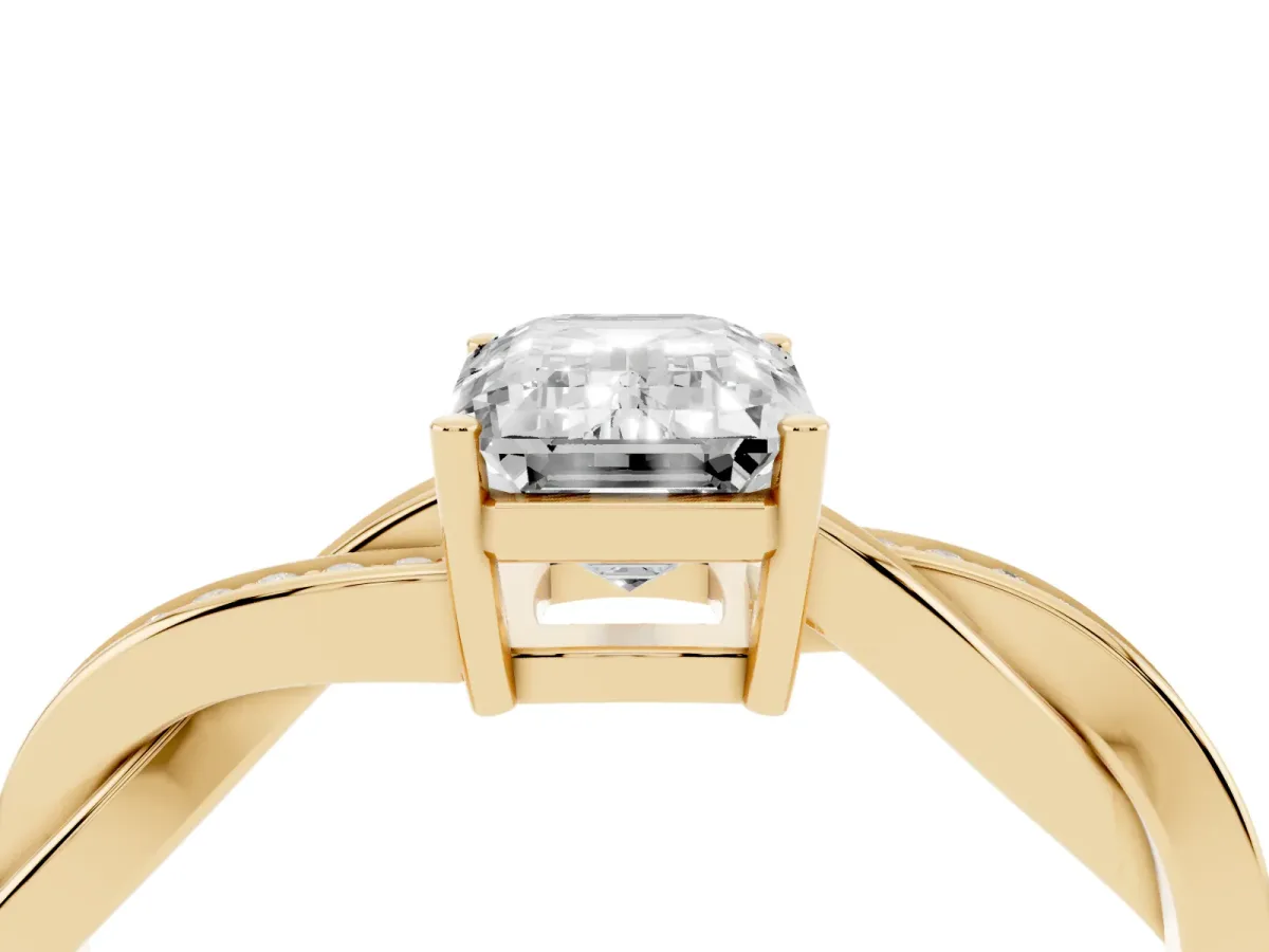 Emerald Cut Solitaire Twisted Pave Diamond Ring with Four-Prong Setting Yellow gold
