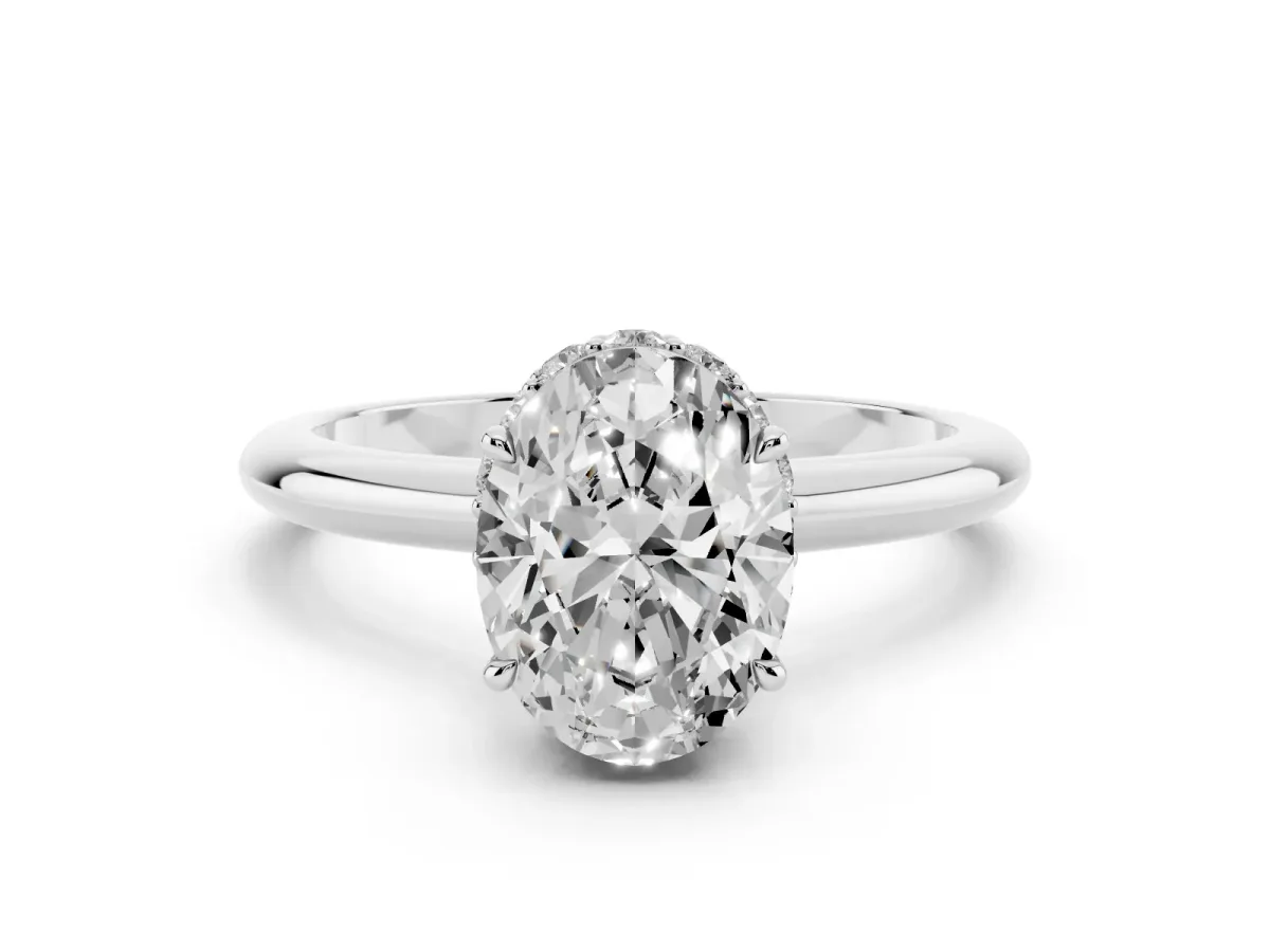 Oval Cut Brilliant Solitaire Engagement Ring with Six-Prong Setting and Classic Band White gold