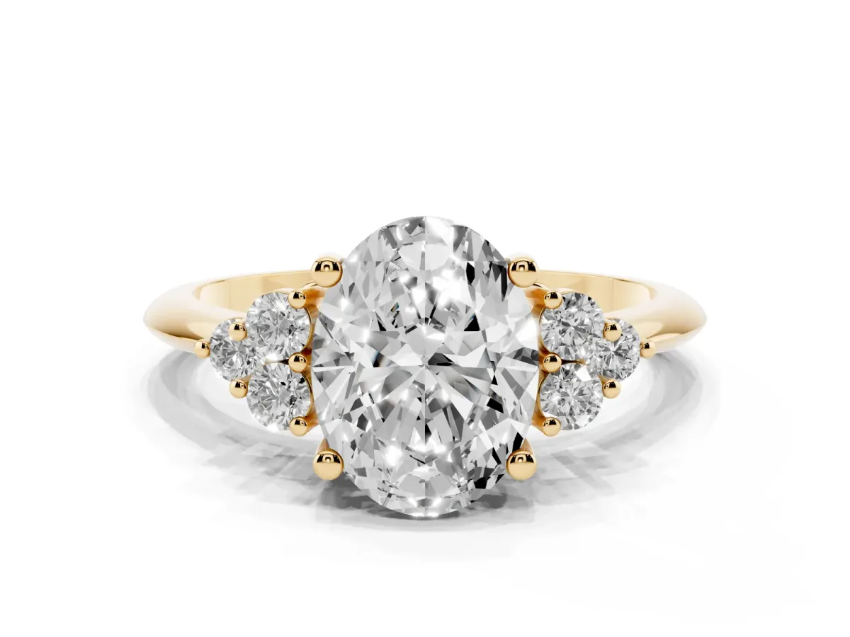 Oval Cut Cut Diamond Cluster Ring with Solitaire Band and Four-Prong Setting Yellow gold