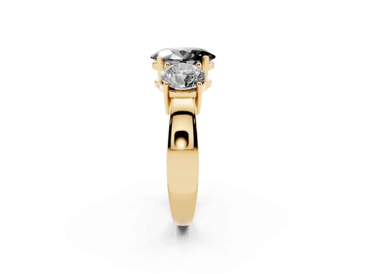Fancy Black Three-Stone Oval Cut Diamond Ring with Round Side Stones, Classic Band, and Four-Prong Setting Yellow gold