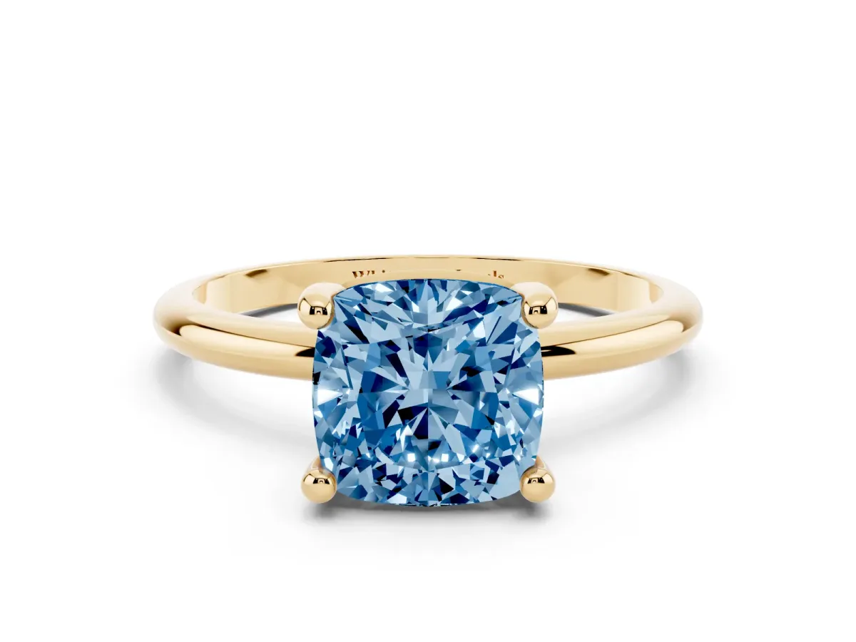 Fancy Blue Cushion Cut Solitaire Diamond Ring with 4-Prong Setting on a Classic Band Yellow gold